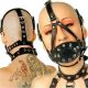 Black soft muzzle decorated with lots of straps