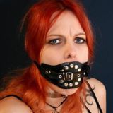 Black muzzle with a gag