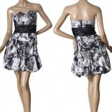 Bandeau dress with newspaper print strapless and black belt