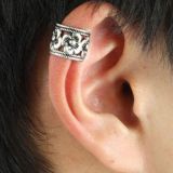 Steel clip-on earring with flowers