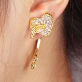 Golden earrings with a heart