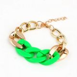 Golden bracelet with colorful woven