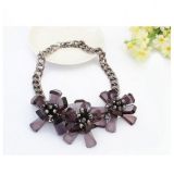 Necklace with oversized flowers