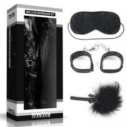 A set of erotic accessories: mask, powder puff and handcuffs