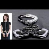 The cuffs and collar on a chain