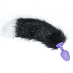 Purple anal plug with a long black and white tail