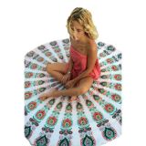 White Boho beach blanket with print of a peacock