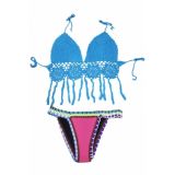 Blue swimsuit with crochet panels