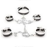 Leather cuffs for neck, hands and legs fastened with chain